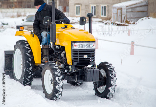 The concept of Minitractor using transport to remove snow