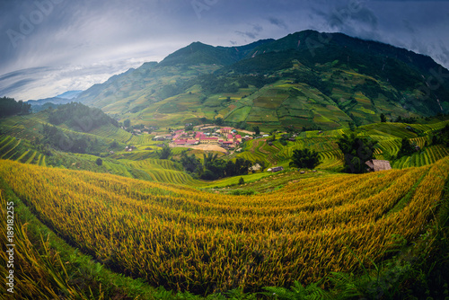 Rice fields on terraced with wooden pavilion at the morning in Mu Cang Chai, YenBai, Vietnam.