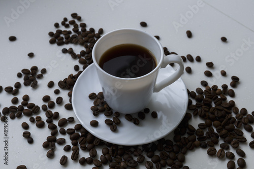 A cup of coffee. White background.