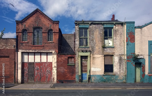 Εκτύπωση καμβά derelict houses and abandoned commercial property on a residential street with b