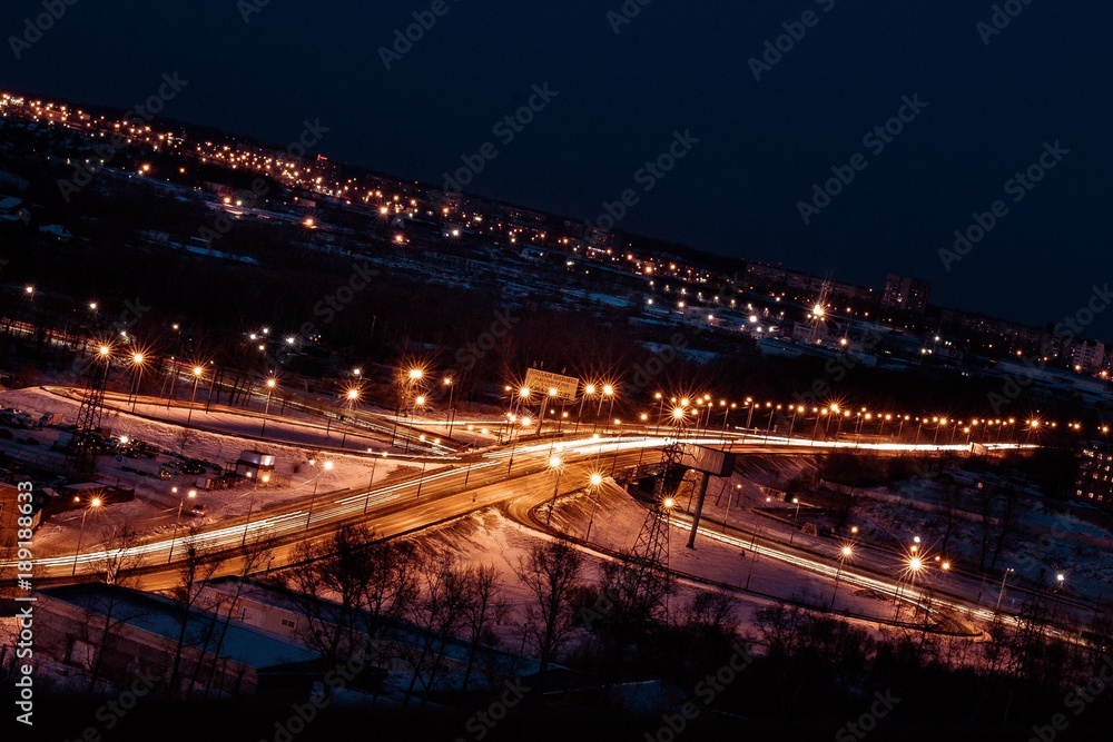 night city view with transport interchange, lights and traffic night city view with transport interchange, lights and traffic
