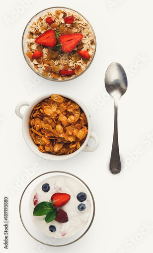 Set of bowls with breakfast meals, isolated