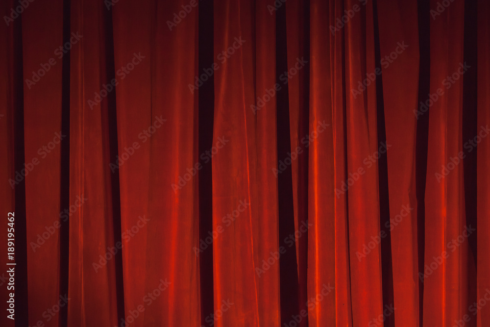 Fototapeta premium Red velvet curtain, background texture