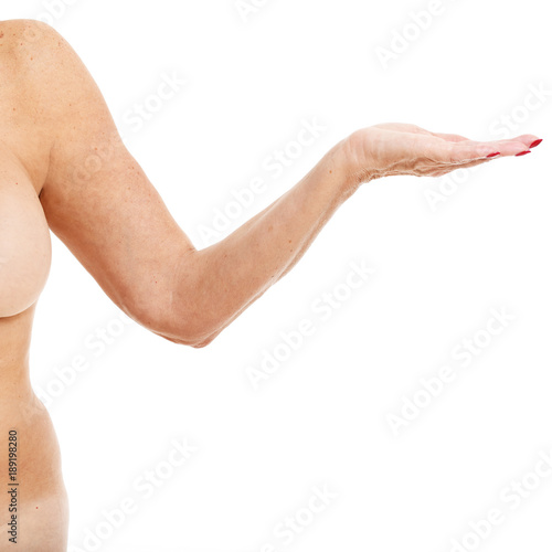 Obese adult woman showing arm over white background