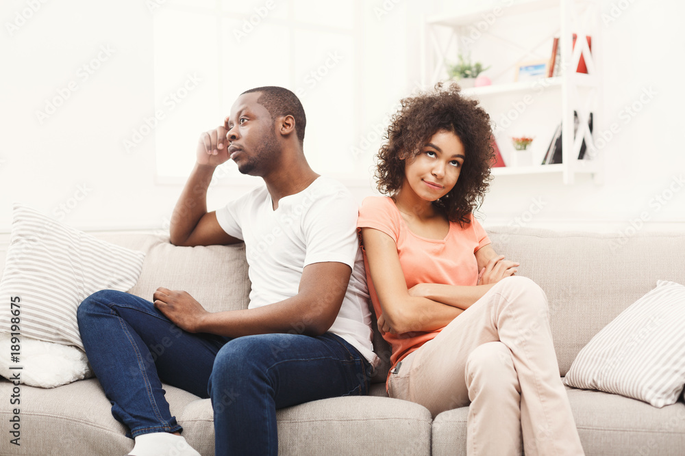 Young black couple quarreling at home