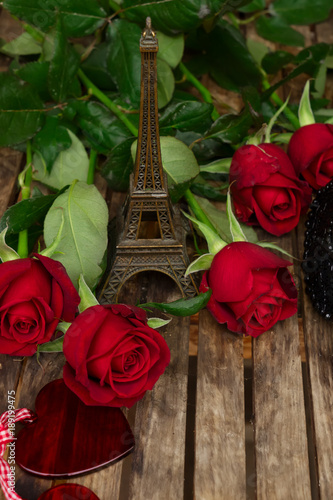 dark red roses on table photo