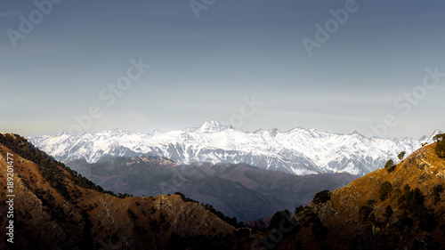 Snow clad beautiful white Mountain Pir Panjal range of Himalayas visible from Mata Vaishno Devi, Katra in Jammu and Kashmir of India