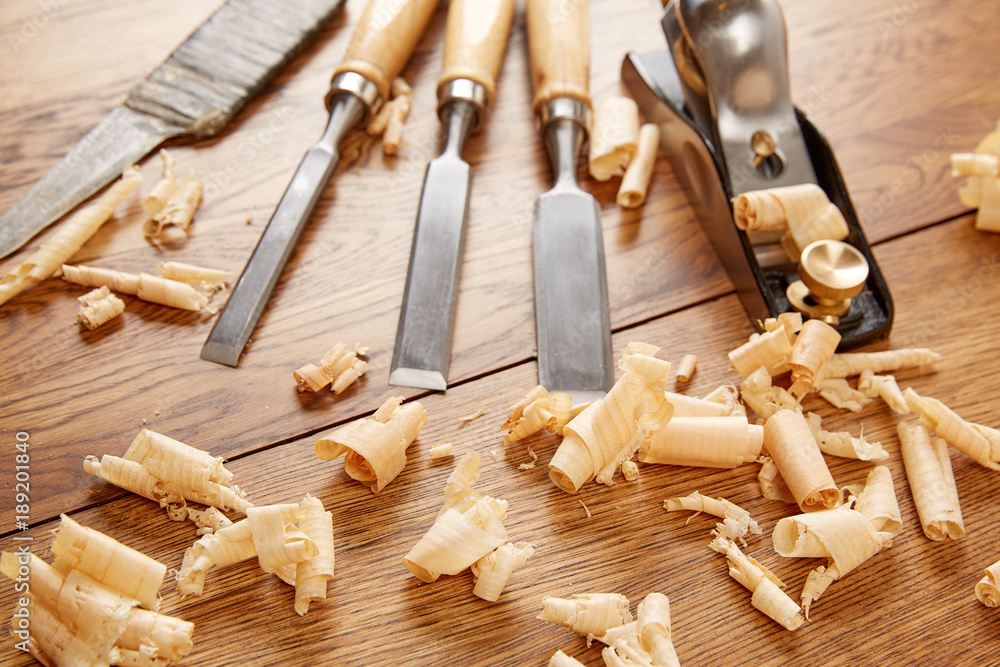 DIY concept. Woodworking and crafts tools. Carpentry hand tools. Planers, chisels, measuring tools. Wooden background. DIY concept. Woodworking and crafts tools. Carpentry hand tools. Planers, chisels, measuring tools. Wooden background.