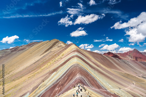 Vinicunca Rainbow Mountain is located between Cusco and Puno in Peru.