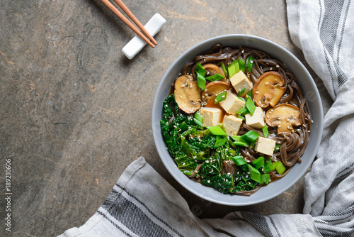 Photos Vegetarian soup with kale mushrooms and soba noodle