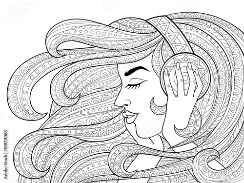 Young beautiful girl with long wavy hair listening to music in headphones. Tattoo or adult antistress coloring page. Black and white hand drawn doodle for coloring book