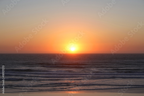 Coast of the sea at colorful sunset. Yellow Sun Set in The Middle of The Ocean © mustapha