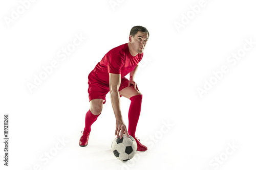 Professional football soccer player with ball isolated white background © master1305