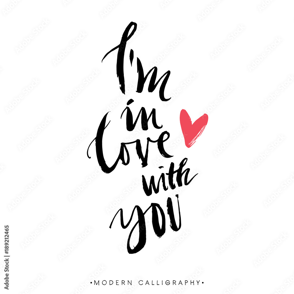 Fototapeta premium I am in love with you. Modern brush calligraphy. Handwritten ink lettering. Hand drawn design elements.