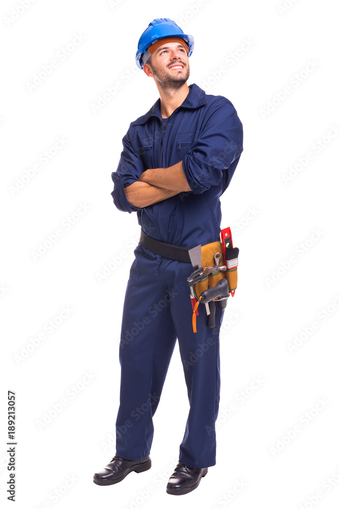 Full length of a young worker standing on a white background Full length of a young worker standing on a white background