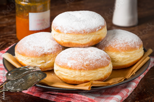 Group of Krapfen on a Plate with Jam