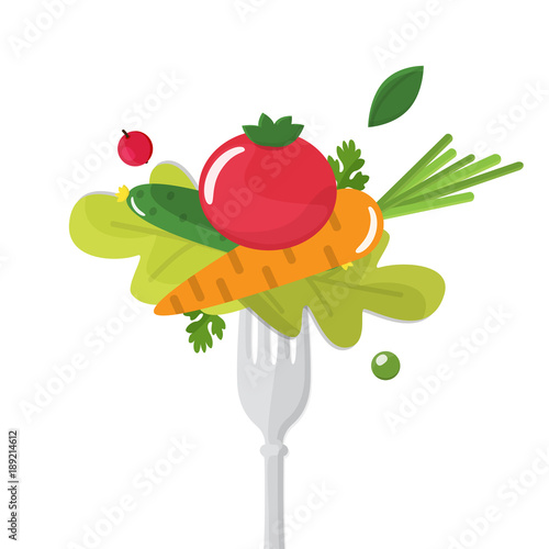 Vegetables sticked on fork. Healthy eating concept.