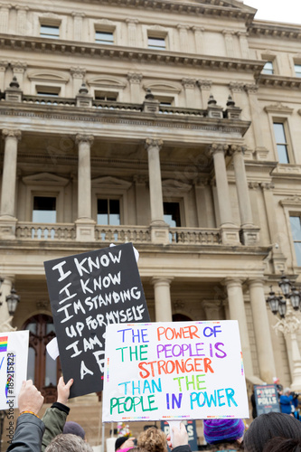 Signs from the Women's March January 2018 in Lansing, Michigan photo