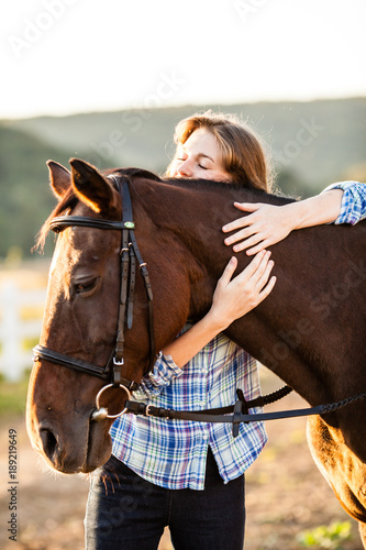 Beautiful girl with horse © oksix
