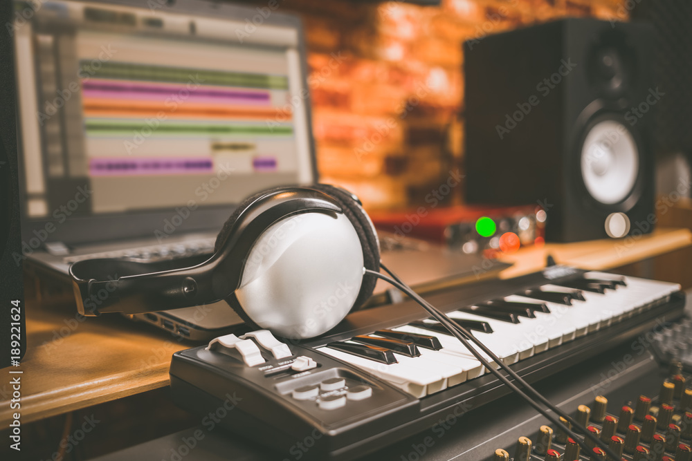 computer music, home studio equipment. headphone on midi keyboard  synthesizer with laptop computer and loudspeaker monitor Stock-Foto | Adobe  Stock