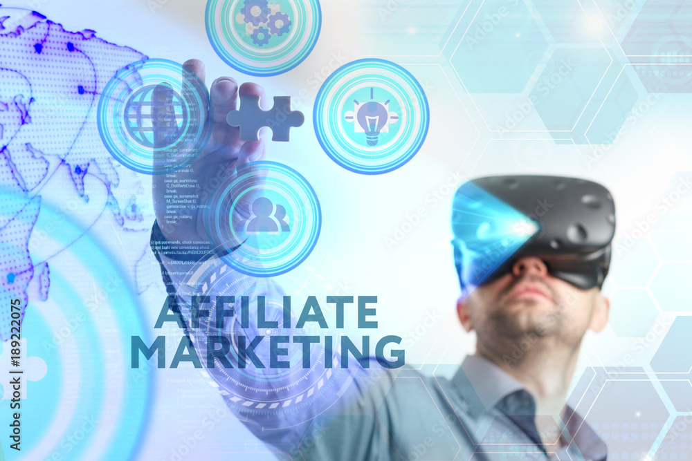 Business, Technology, Internet and network concept. Young businessman working in virtual reality glasses sees the inscription: Affiliate marketing Business, Technology, Internet and network concept. Young businessman working in virtual reality glasses sees the inscription: Affiliate marketing