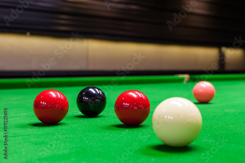 Snooker balls on the table at snooker club.