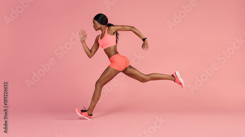 Fotografie, Obraz Young athlete running indoors