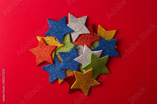 set of glittering stars on red background