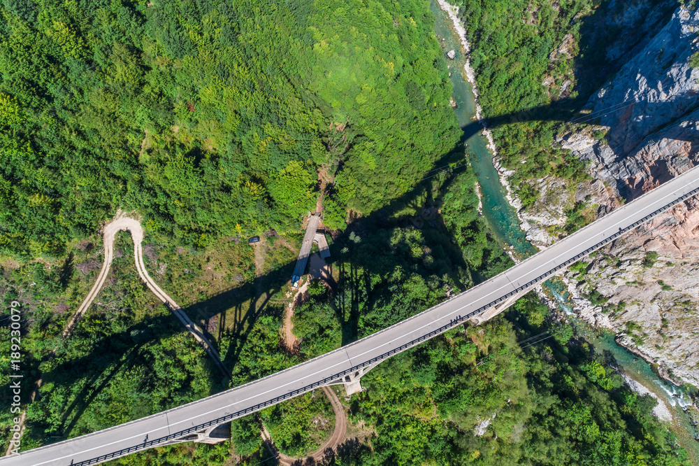 Aerial view of the Djurdjevica Bridge over the Canyon of the Tara River. Montenegro. Aerial view of the Djurdjevica Bridge over the Canyon of the Tara River. Montenegro.