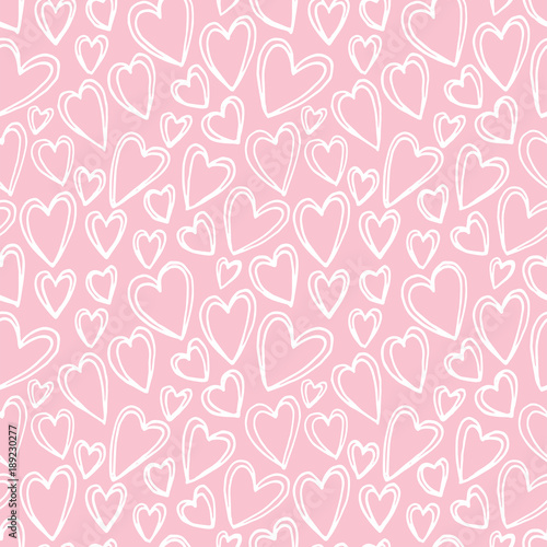 Vector seamless pattern in sketch style for Valentine's Day. Doodle style seamless vector pattern on pink. Cute doodle style hearts seamless vector pattern. Valentine's Day handwritten background.