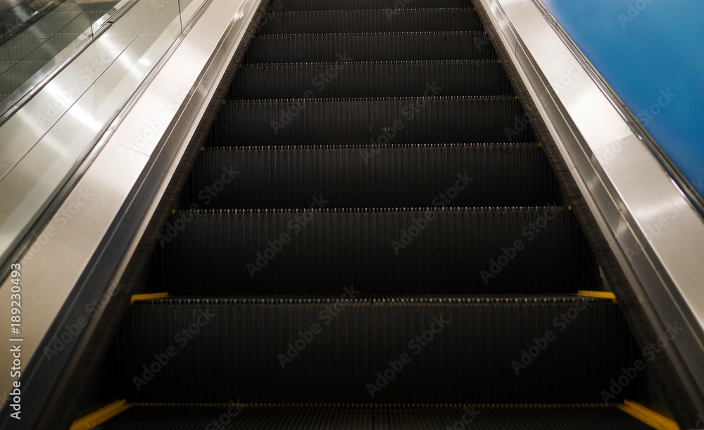 Fototapeta premium Escalator in department store close up 