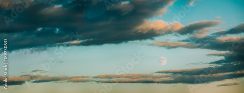 Full Moon At Blue Evening Cloudscape Sky Background