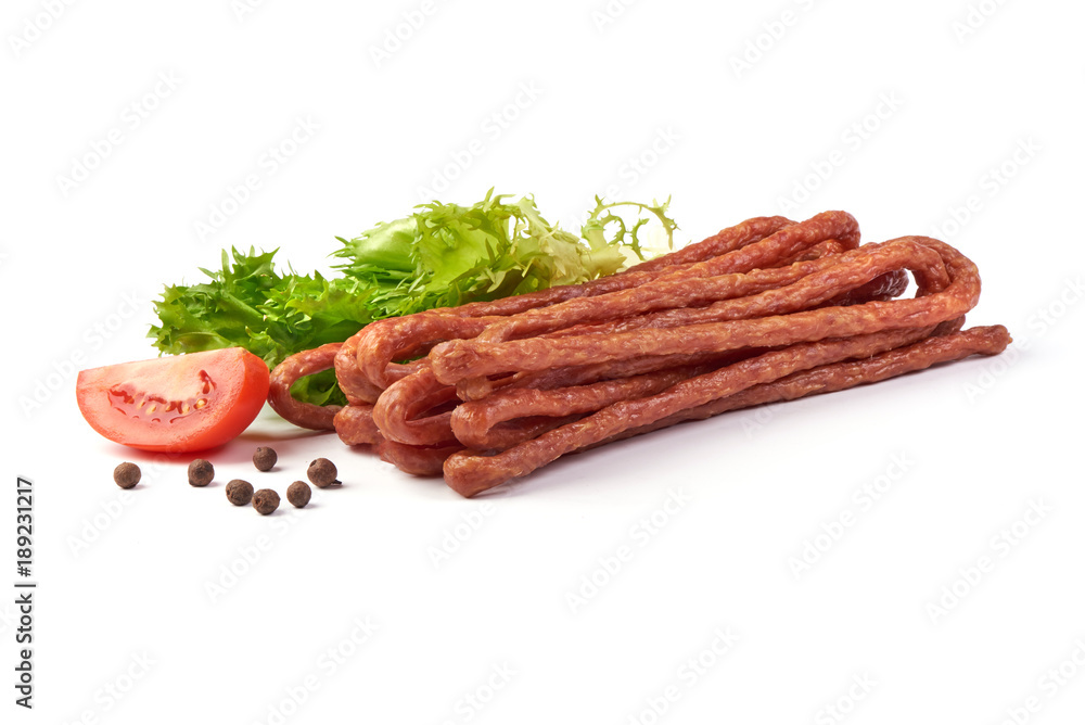 Kabanos. Polish long thin dry sausage made of pork. Isolated on white background. Kabanos. Polish long thin dry sausage made of pork. Isolated on white background.