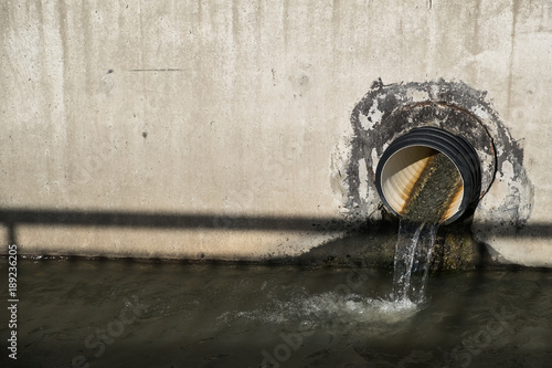 Quadro em tela the water is drained through the pipe into the channel