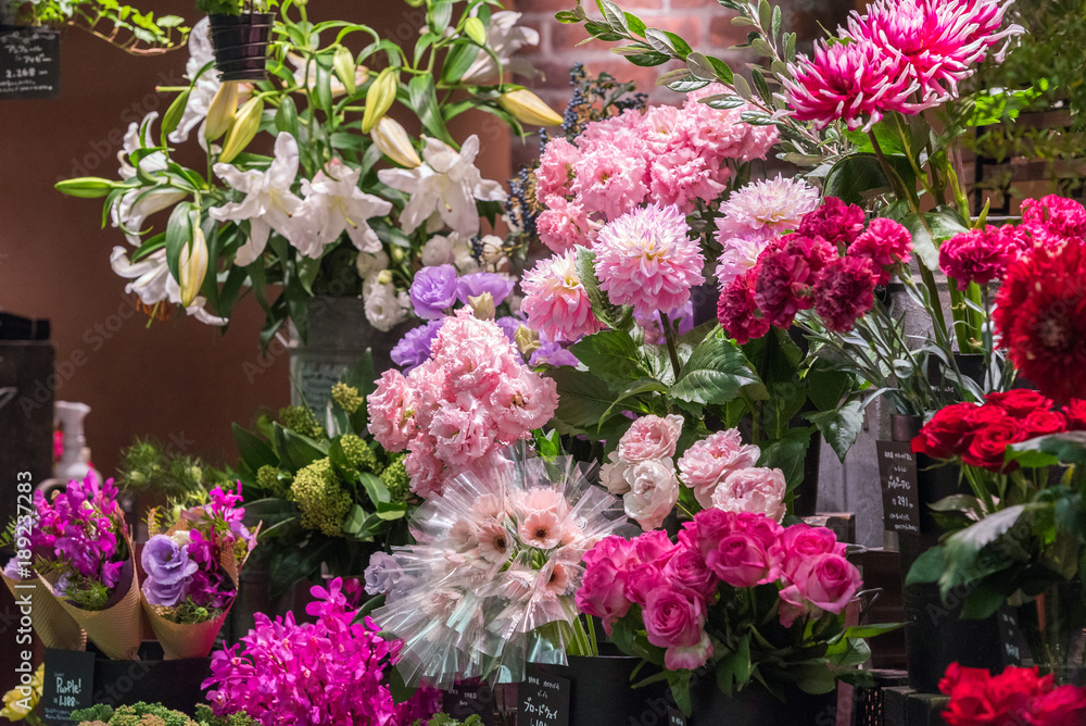 Flowers on the counter of a flower shop in Japan. Copy space for text.