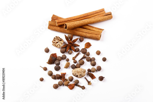 Wallpaper Mural Spices for mulled wine. Spices for mulled wine isolated white background. Cinnamon sticks, roast pepper, ginger, tubberry, nutmeg, cardamom, cloves. Torontodigital.ca