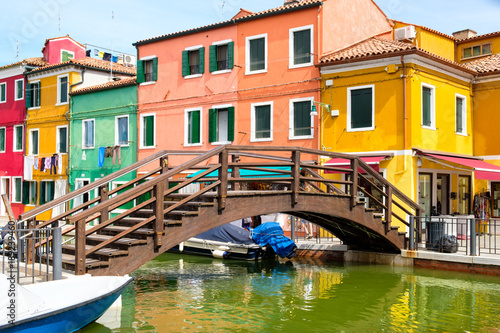 Colorful houses and canals on the island of Burano near Venice © kmiragaya