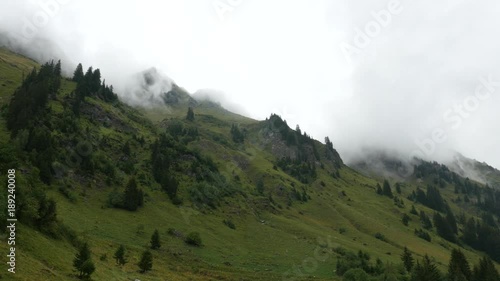 disturbing mists on a rocky slope - brumes inquiétantes sur une pente rocheuse photo