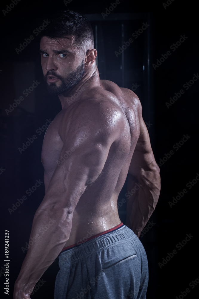 Fototapeta premium Muscle Man in the Gym