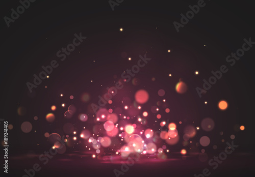 Christmas pink lights. Background of bright glow bokeh.