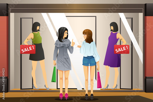 Women Window Shopping in Front of a Clothing Store
