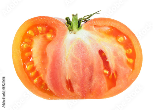 Big red tomato cut in half inside longitudinal section isolated on white background