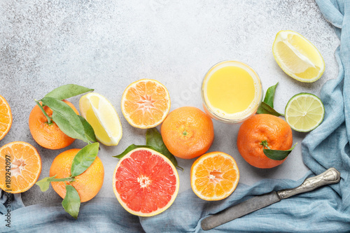 Citrus fruits. Mandarin, grapefruit, lime, tangerine, lemon and juice. Top view © strekoza64
