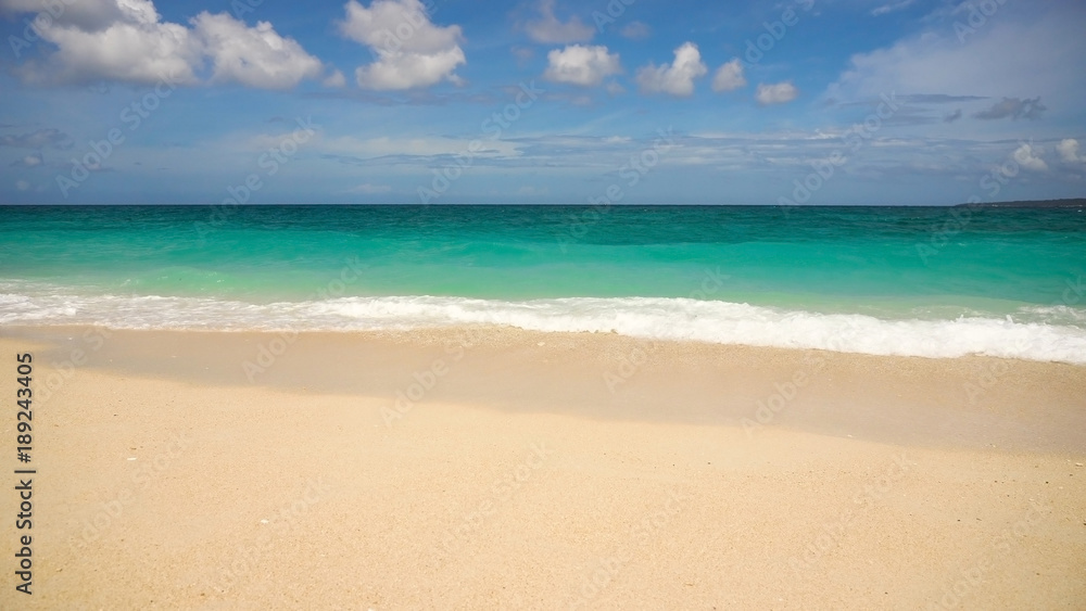 Beach, sea, sand,wave. Tropical beach, blue sky, clouds. Seascape ocean and beautiful beach paradise.Philippines Boracay Travel concept