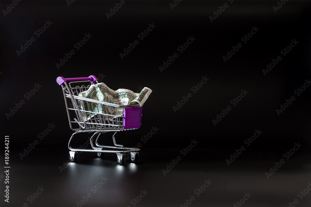 the dollar is in a cart from a supermarket for food the dollar is in a cart from a supermarket for food