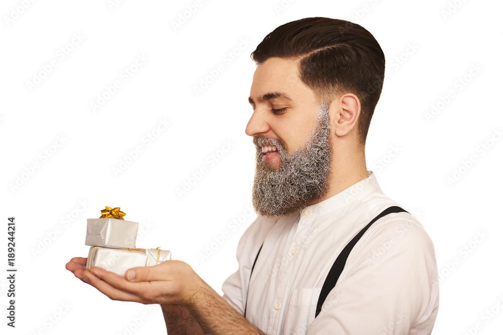 Portrait of handome beard man with gift boxes isolated on white background Portrait of handome beard man with gift boxes isolated on white background