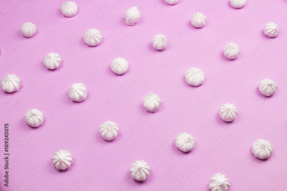 Sweets on a beautiful pastel surface in a minimalist style. Sweets on a beautiful pastel surface in a minimalist style.