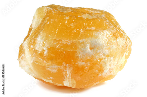 orange calcite from Mexico isolated on white background photo