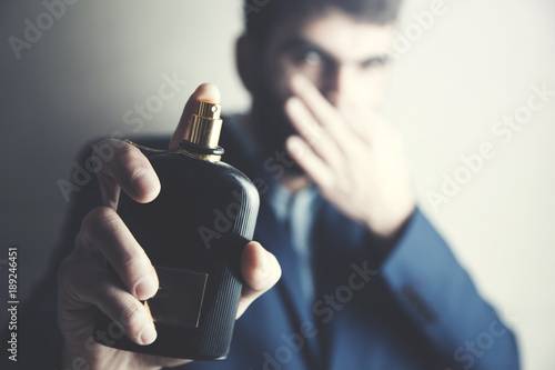 man hand bad odor perfume