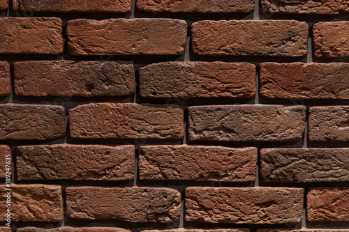 Stone wall brick texture background beige surface facade for design and decoration.